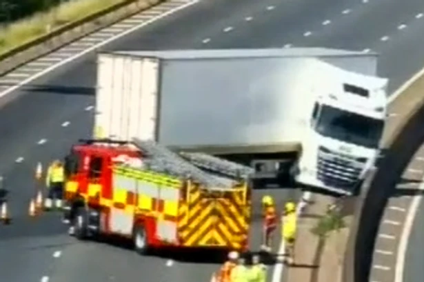Ten-mile tailbacks on M5 near Birmingham as lorry jack-knifes causing spill