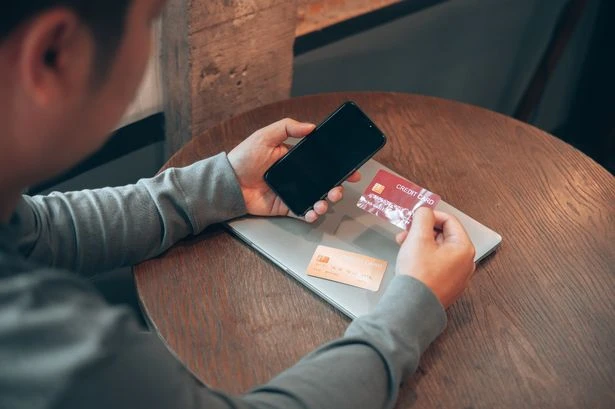 Councillors clash over security after card fraud police probe