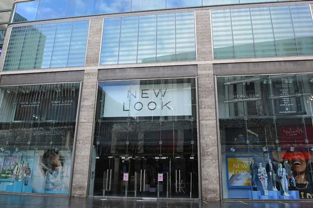 New Look's £30 satin dress is 'very flattering' and 'doesn't show your lumps and bumps'