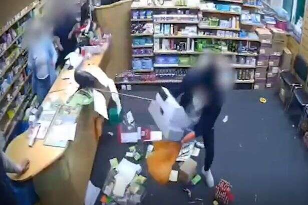 Sneaky robber threatens Birmingham pharmacy staff with 'gun' using object to make swift exit  