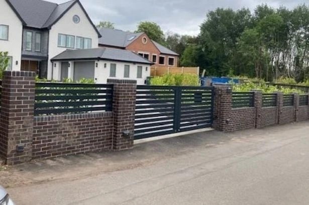 Council planners to make final decision on boundary gate dispute between Solihull neighbours
