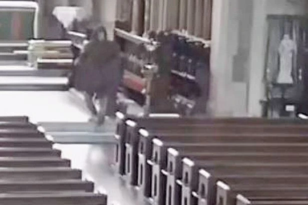 Watch as church's hospitality 'abused' by daytime raider who swipes £6k brass eagle