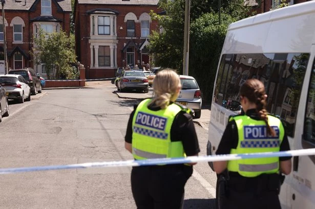 Police hunting knifeman after Moseley disorder