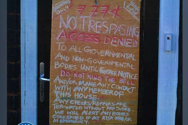 ‘NO TRESPASING ACCESS DENIED’ – the damning sign on Birmingham home where couple buried son the garden