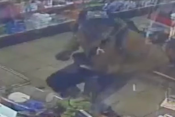 Watch: Police hunting man who danced into Birmingham shop