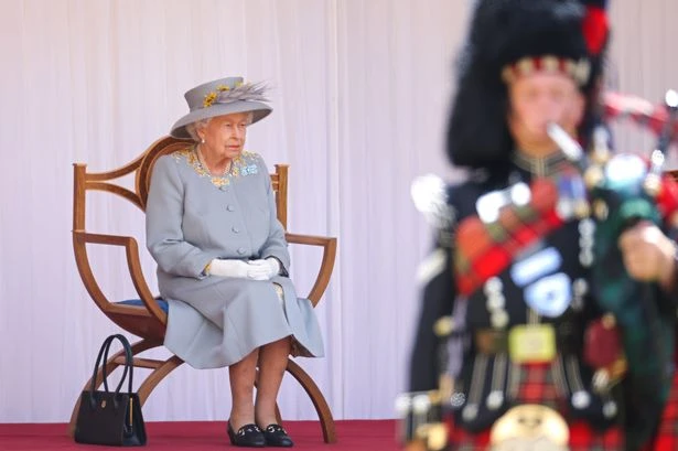 Queen celebrates birthday with military parade and Red Arrows flypast