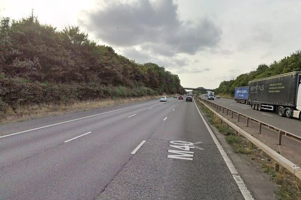 Witness appeal after woman dies on M40 as lorry hits pedestrian