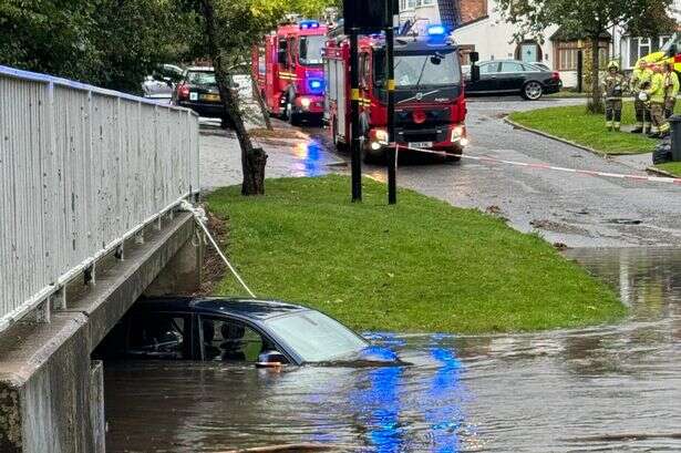 West Midlands Police issue warning after driver rescued from car attempting to cross flood waters