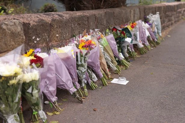 Tributes left at scene of horror Dudley crash that left three men dead