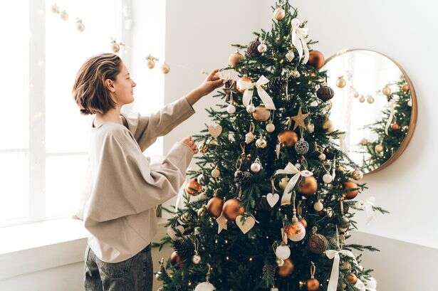 Woman shares 'genius' way to tie perfect bows for Christmas decorating