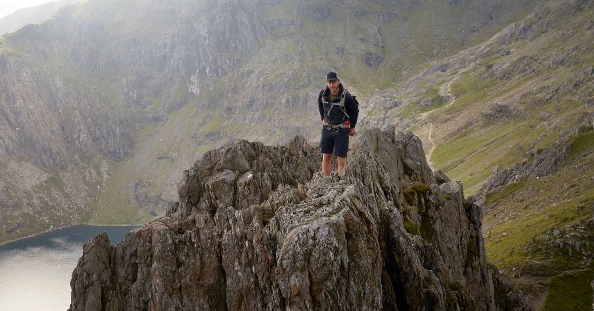 Man climbs famous mountain but is floored by what he finds at the top