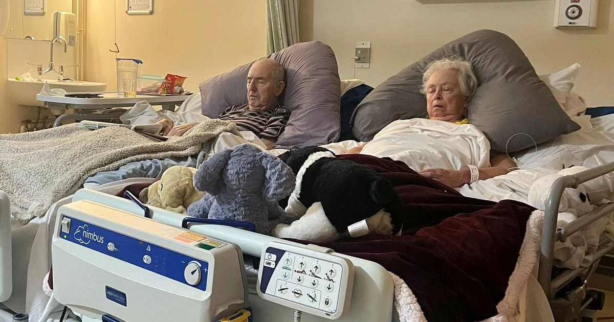 Devoted couple lie side-by-side for last time before dying just days apartCancer