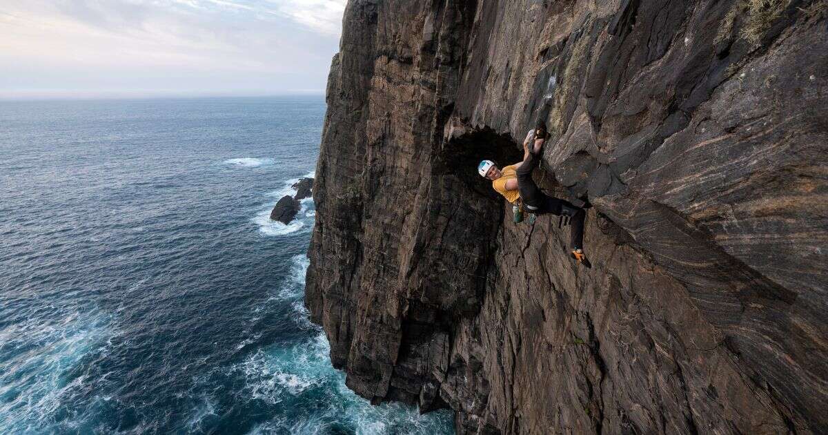 Nail-biting moment British rock climber reaches 'improbable' peak despite slipClimbing