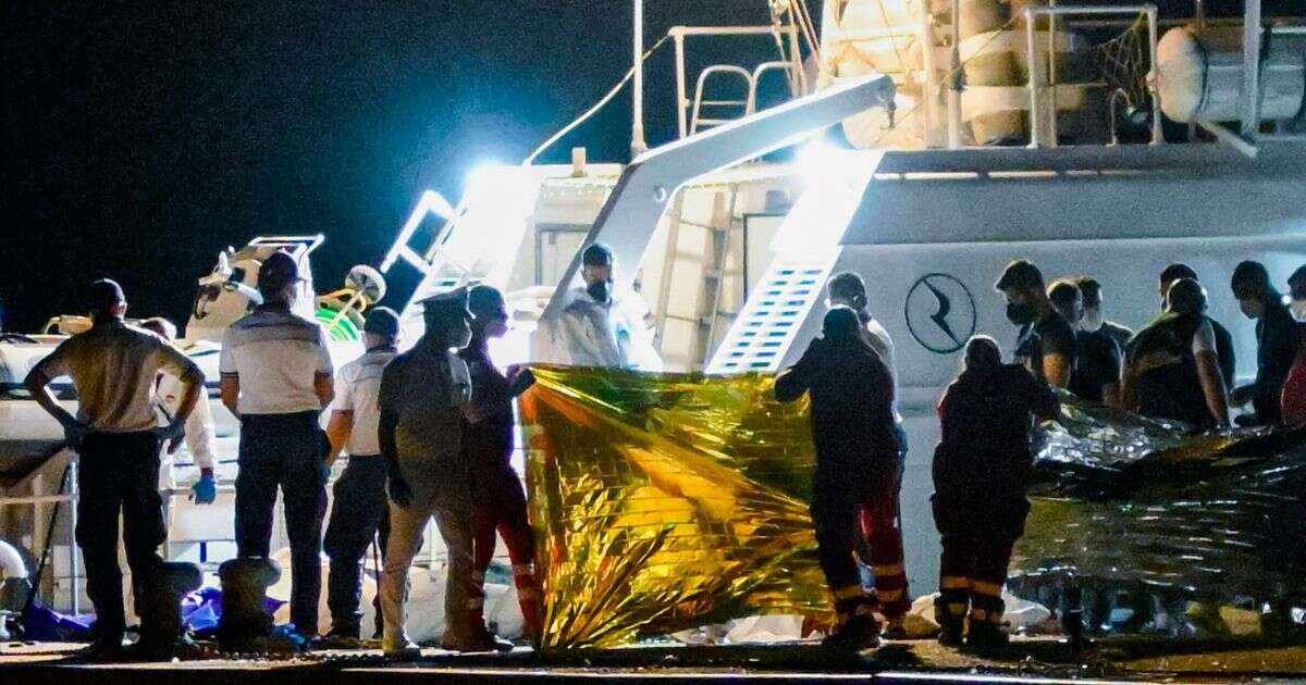 Italy coastguard searches for dozens of migrants missing after ship capsizes