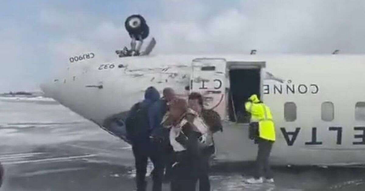 Passengers on Delta plane that flipped during landing were 'hanging upside down like bats'