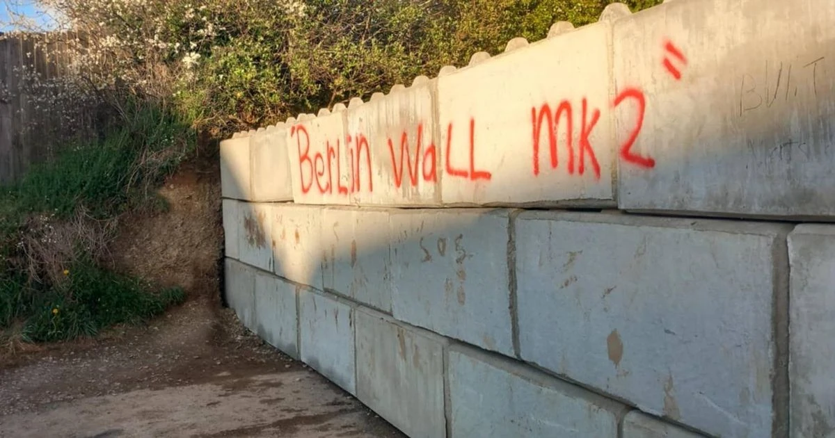 'Berlin Wall 2' must be demolished after being built in middle of housing estate