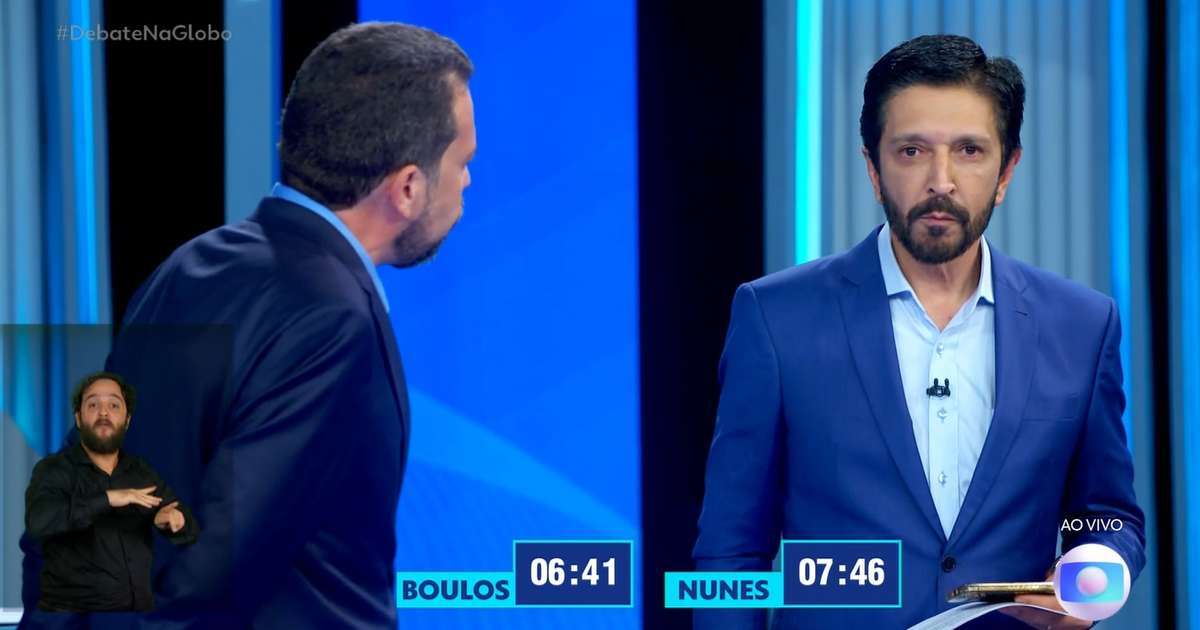 Nunes leva bonca de Tralli por usar celular e fazer propaganda em debate da TV Globo